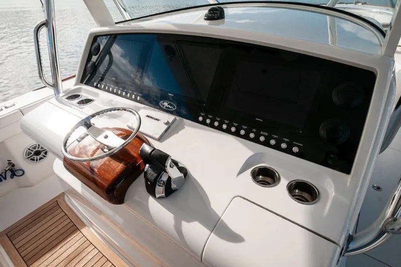  Yacht Photos Pics 2021 Valhalla Boatworks V-46 helm with modern controls and sleek dashboard design.