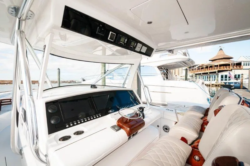  Yacht Photos Pics 2021 Valhalla Boatworks V-46 helm with advanced navigation system and luxurious seating.