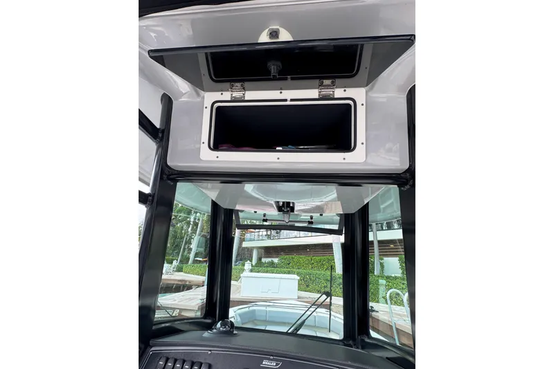  Yacht Photos Pics 2024 Boston Whaler 280 Outrage boat interior storage compartment.