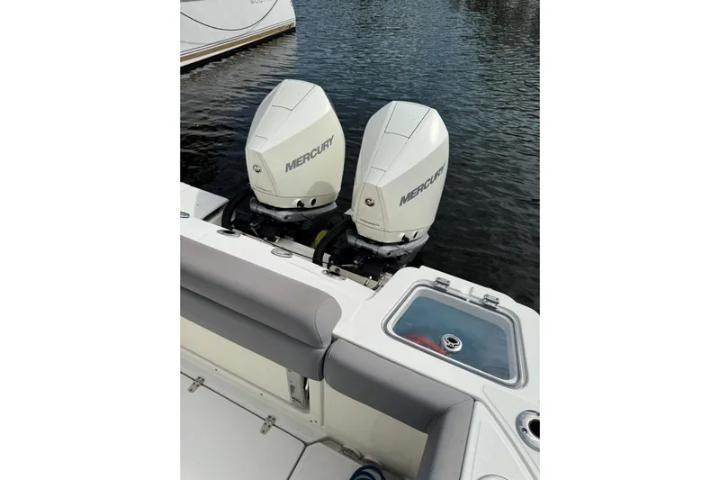  Yacht Photos Pics 2024 Boston Whaler 280 Outrage with dual Mercury outboard engines on water.