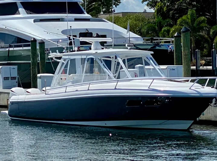  Yacht Photos Pics 2015 Intrepid 375 Walkaround boat docked in marina.