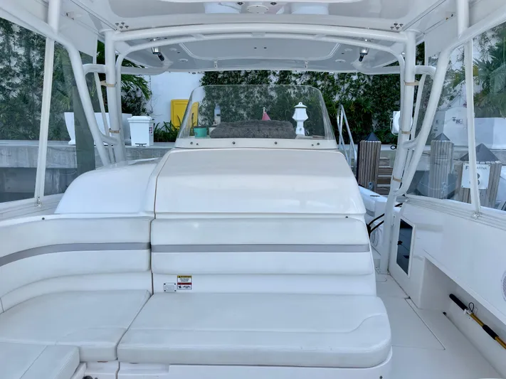  Yacht Photos Pics 2015 Intrepid 375 Walkaround boat interior with white seating and helm station.