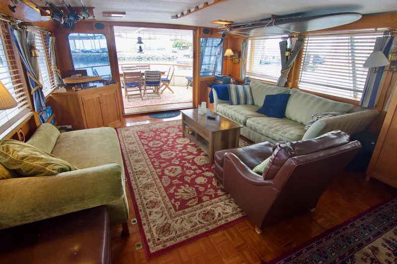 Grand Times Yacht Photos Pics Cozy interior of a 1969 Grand Banks Classic yacht with elegant seating and nautical decor.