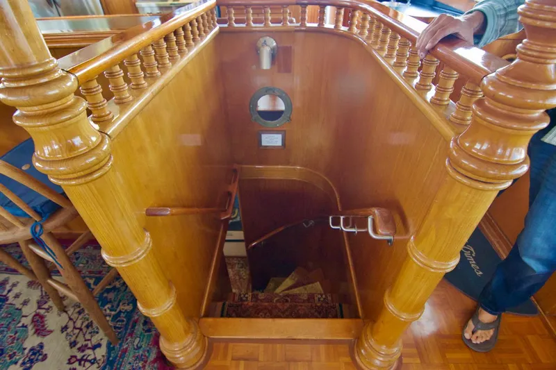 Grand Times Yacht Photos Pics Interior of 1969 Grand Banks Classic yacht with wooden staircase and nautical decor.