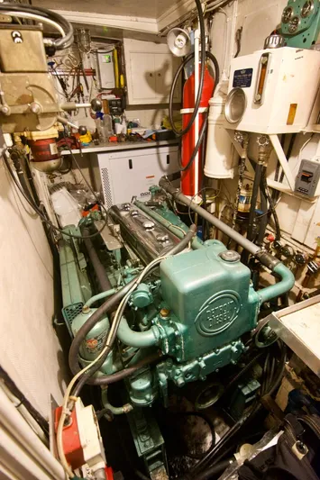 Grand Times Yacht Photos Pics Engine room of a 1969 Grand Banks Classic boat, featuring a vintage diesel engine.