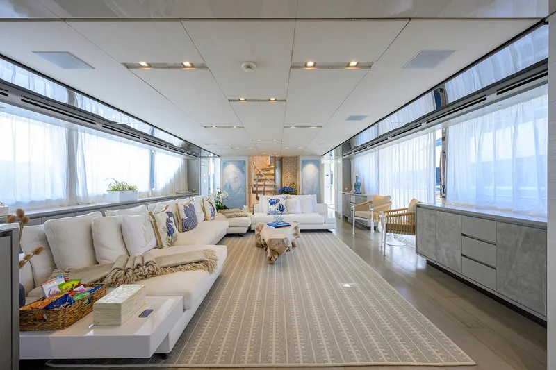Halcyon Yacht Photos Pics Luxurious interior of 2018 Sanlorenzo SD112 yacht with elegant seating and modern decor.