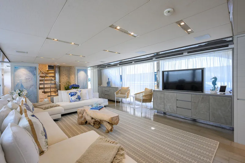 Halcyon Yacht Photos Pics Luxurious interior of 2018 Sanlorenzo SD112 yacht with modern decor and elegant furnishings.