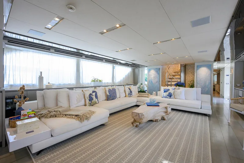 Halcyon Yacht Photos Pics Luxurious interior of 2018 Sanlorenzo SD112 yacht with elegant seating and decor.