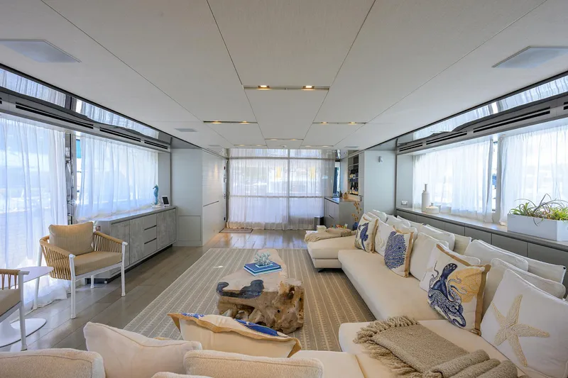 Halcyon Yacht Photos Pics Luxurious interior of 2018 Sanlorenzo SD112 yacht with elegant decor and comfortable seating.