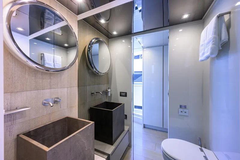 Halcyon Yacht Photos Pics Luxury bathroom on 2018 Sanlorenzo SD112 yacht with modern fixtures and elegant design.