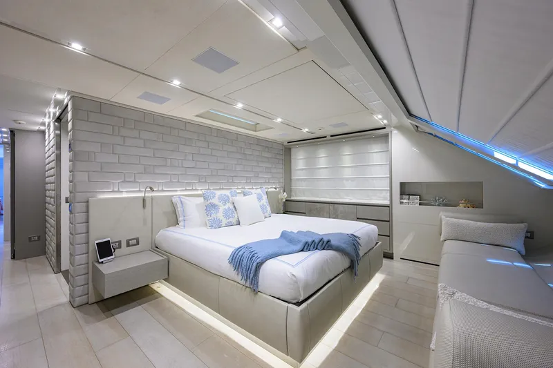 Halcyon Yacht Photos Pics Luxurious Sanlorenzo SD112 2018 yacht bedroom with modern decor and ambient lighting.