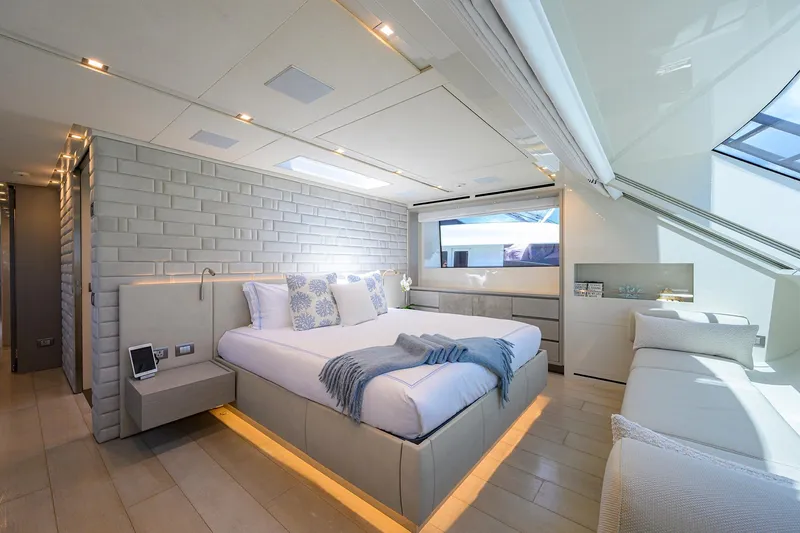 Halcyon Yacht Photos Pics Luxurious bedroom interior on 2018 Sanlorenzo SD112 yacht, featuring modern design and elegant decor.