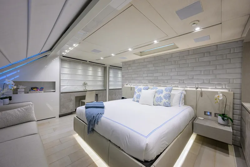 Halcyon Yacht Photos Pics Luxurious bedroom interior on 2018 Sanlorenzo SD112 yacht, featuring modern design and elegant decor.
