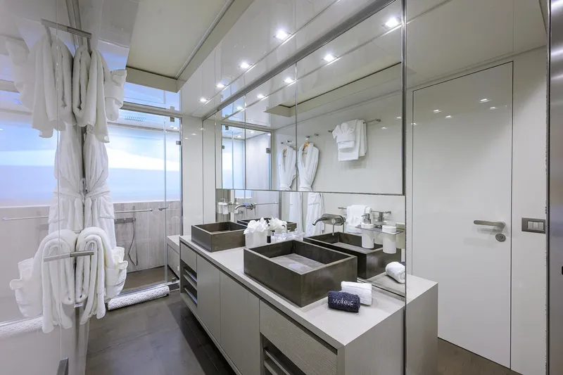 Halcyon Yacht Photos Pics Luxurious bathroom on 2018 Sanlorenzo SD112 yacht with modern fixtures and elegant design.