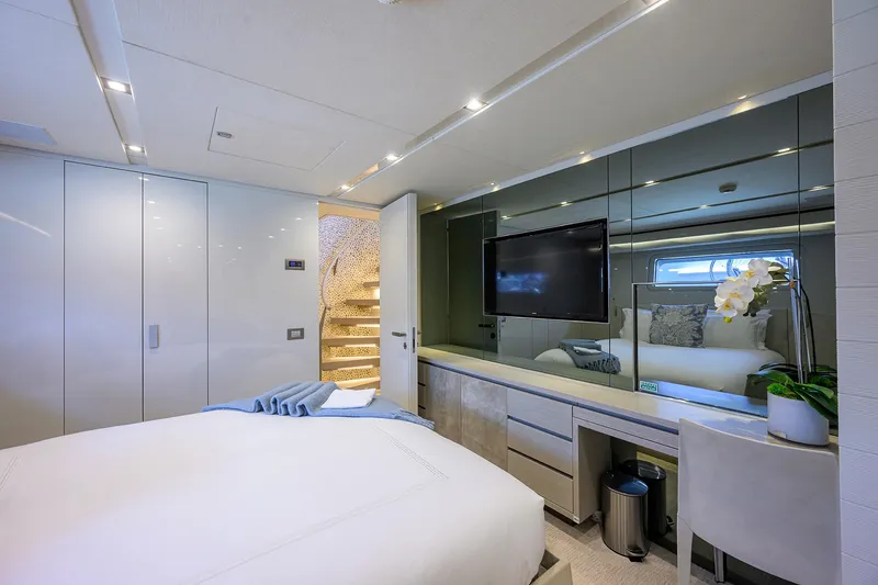 Halcyon Yacht Photos Pics Luxurious bedroom interior on 2018 Sanlorenzo SD112 yacht with modern decor and elegant furnishings.