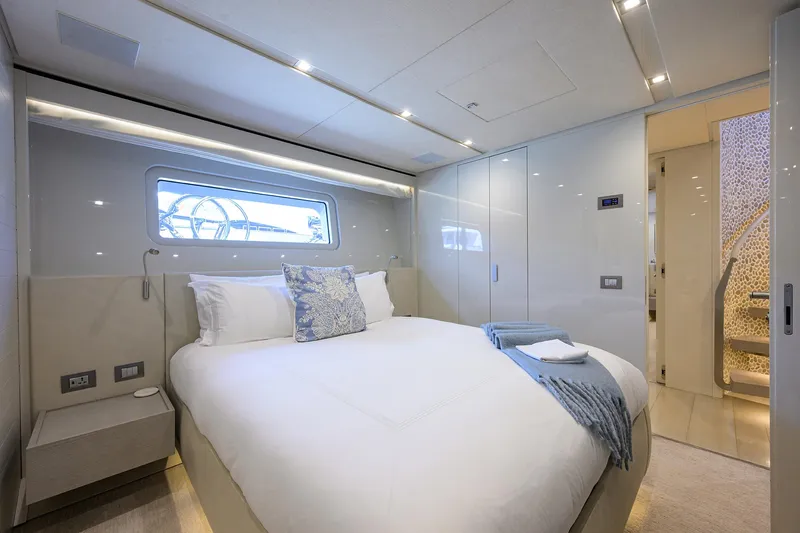 Halcyon Yacht Photos Pics Luxurious bedroom interior of 2018 Sanlorenzo SD112 yacht with modern design and elegant decor.