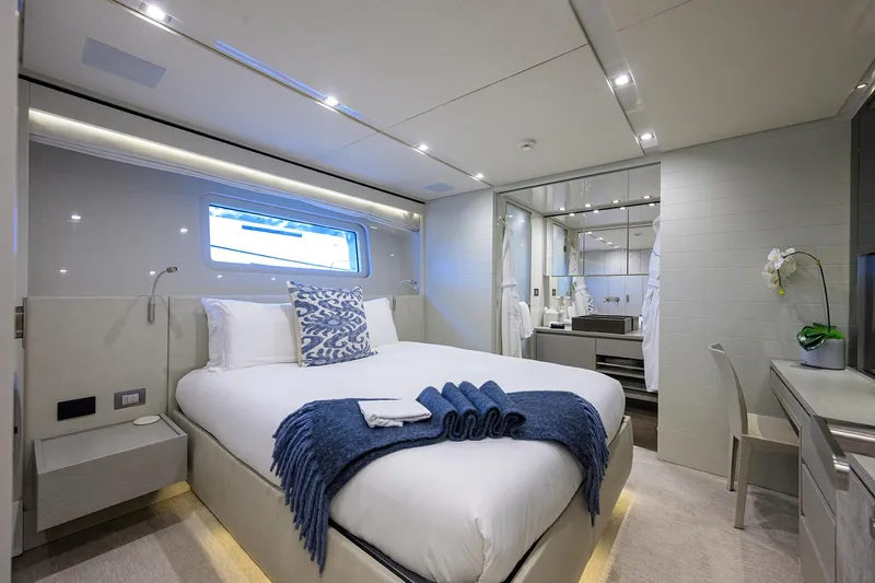 Halcyon Yacht Photos Pics Luxurious bedroom interior on 2018 Sanlorenzo SD112 yacht, featuring modern design and elegant decor.