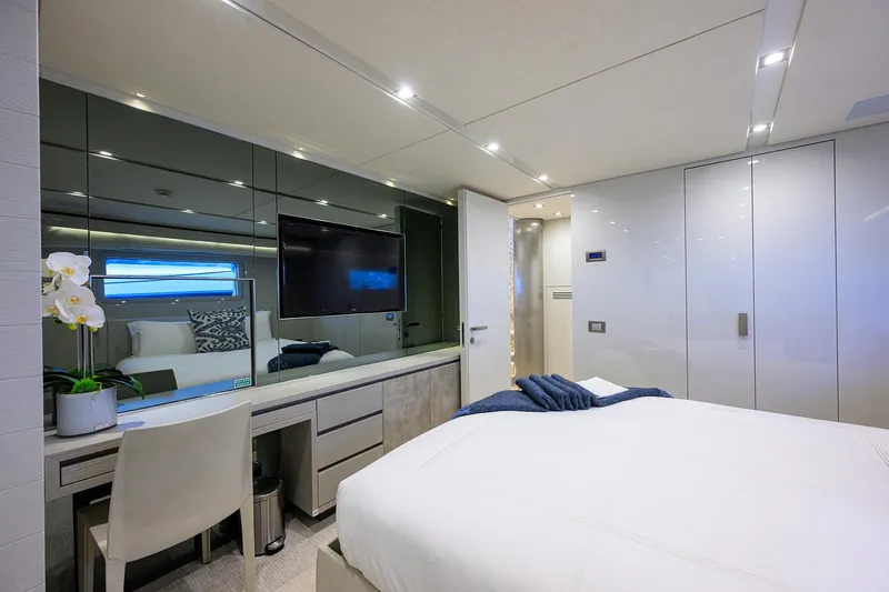 Halcyon Yacht Photos Pics Luxurious bedroom interior on 2018 Sanlorenzo SD112 yacht, featuring modern decor and elegant furnishings.