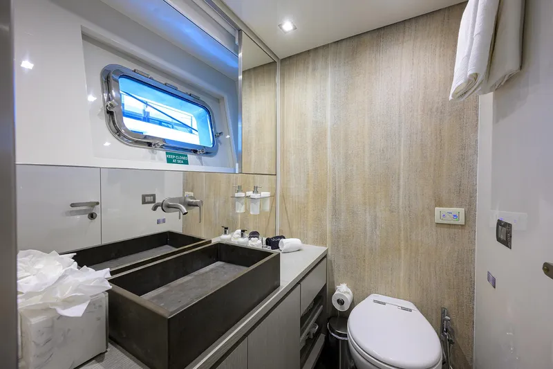 Halcyon Yacht Photos Pics Luxury bathroom on 2018 Sanlorenzo SD112 yacht with modern fixtures and ocean view.
