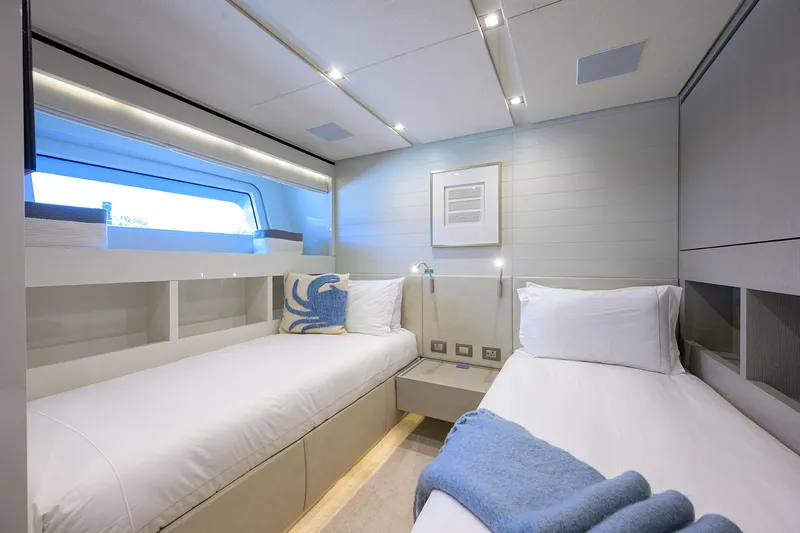 Halcyon Yacht Photos Pics Luxurious twin cabin interior of 2018 Sanlorenzo SD112 yacht with modern decor.