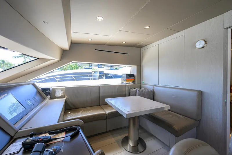 Halcyon Yacht Photos Pics Luxurious interior of 2018 Sanlorenzo SD112 yacht with modern seating and table.