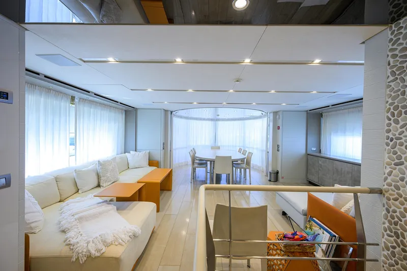 Halcyon Yacht Photos Pics Luxurious interior of 2018 Sanlorenzo SD112 yacht with modern seating and dining area.