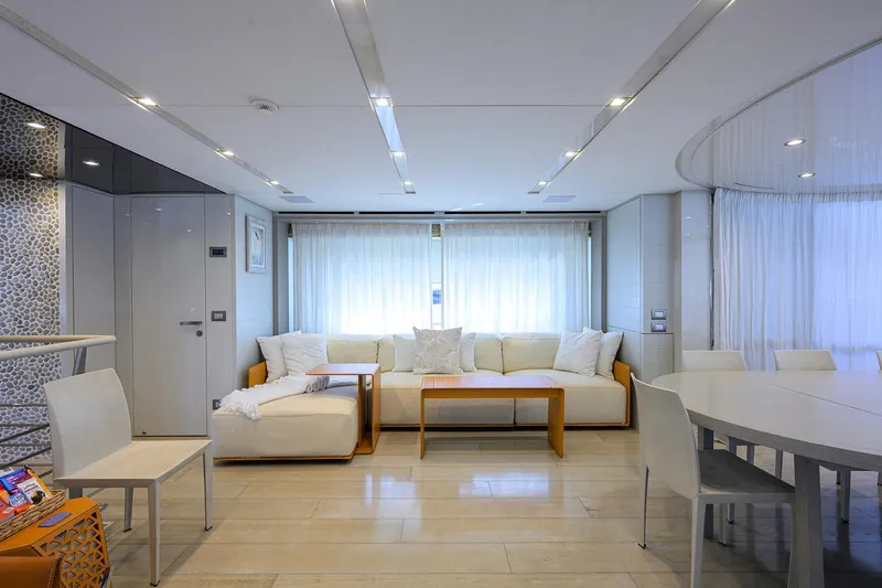 Halcyon Yacht Photos Pics Luxurious interior of 2018 Sanlorenzo SD112 yacht with modern seating and dining area.