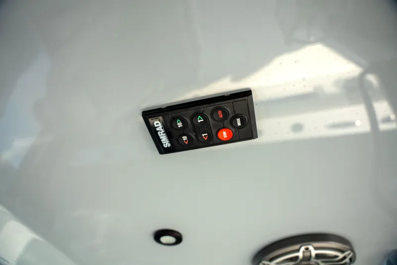  Yacht Photos Pics Simrad control panel on Freeman 28 boat, 2024 model, featuring navigation buttons.