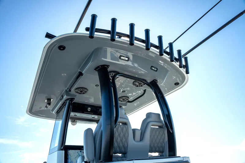  Yacht Photos Pics 2024 Freeman 28 boat with sleek design and modern seating under a clear blue sky.