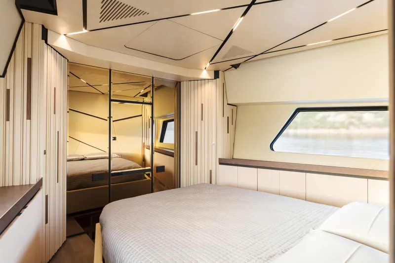 Maori 64 Yacht Photos Pics Luxurious interior of 2025 Maori M64 yacht with modern design and elegant bedroom.