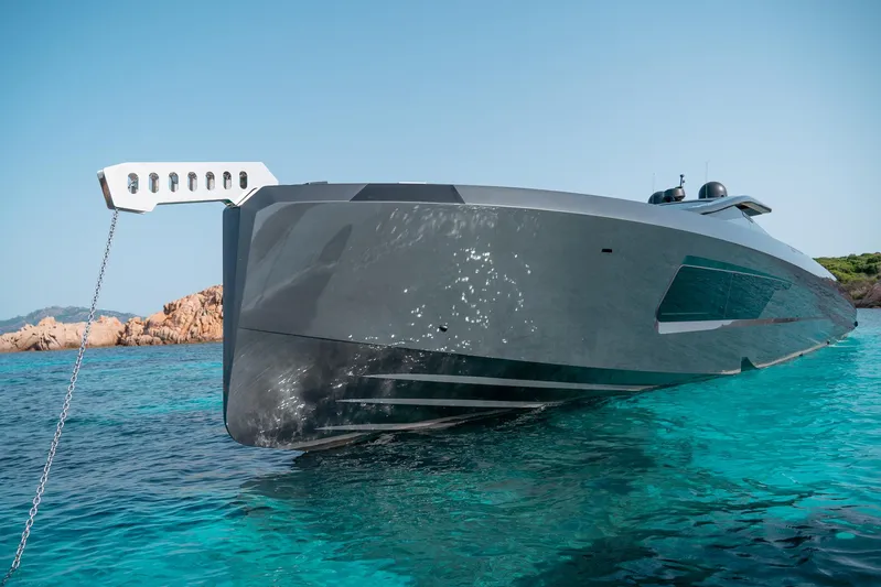 Maori 64 Yacht Photos Pics Futuristic Maori M64 yacht from 2025 on clear turquoise water.