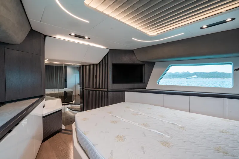 Maori 64 Yacht Photos Pics Luxurious interior of 2025 Maori M64 yacht with modern design and scenic window view.