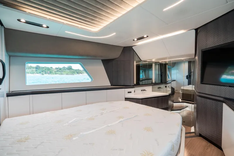 Maori 64 Yacht Photos Pics Luxurious interior of 2025 Maori M64 yacht with modern design and scenic window view.