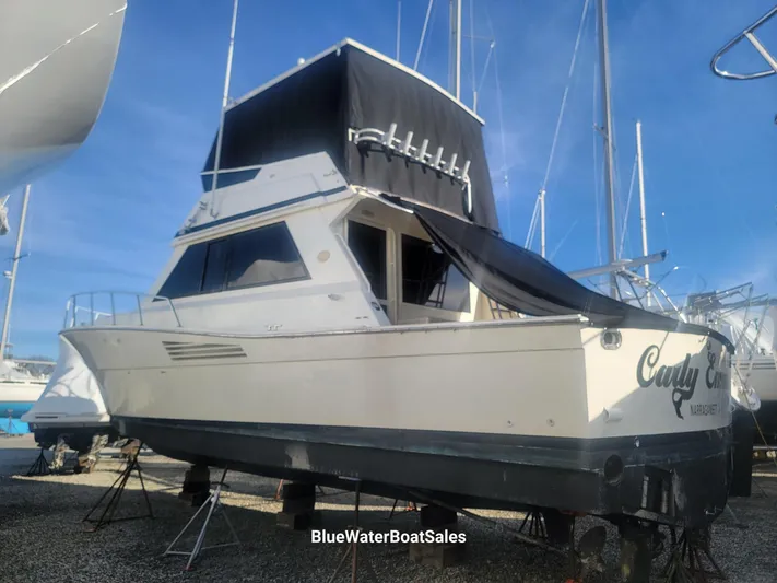  Yacht Photos Pics 1990 Viking 45 Convertible boat on stands, displayed at BlueWaterBoatSales.