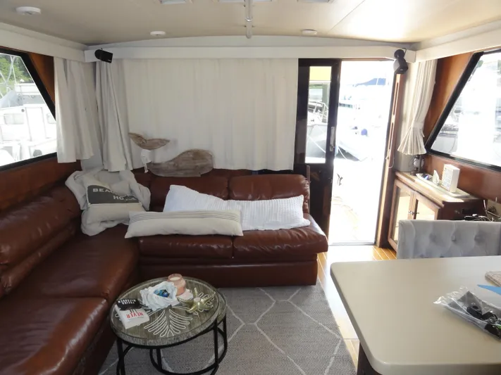  Yacht Photos Pics Interior of 1990 Viking 45 Convertible yacht with leather seating and modern decor.