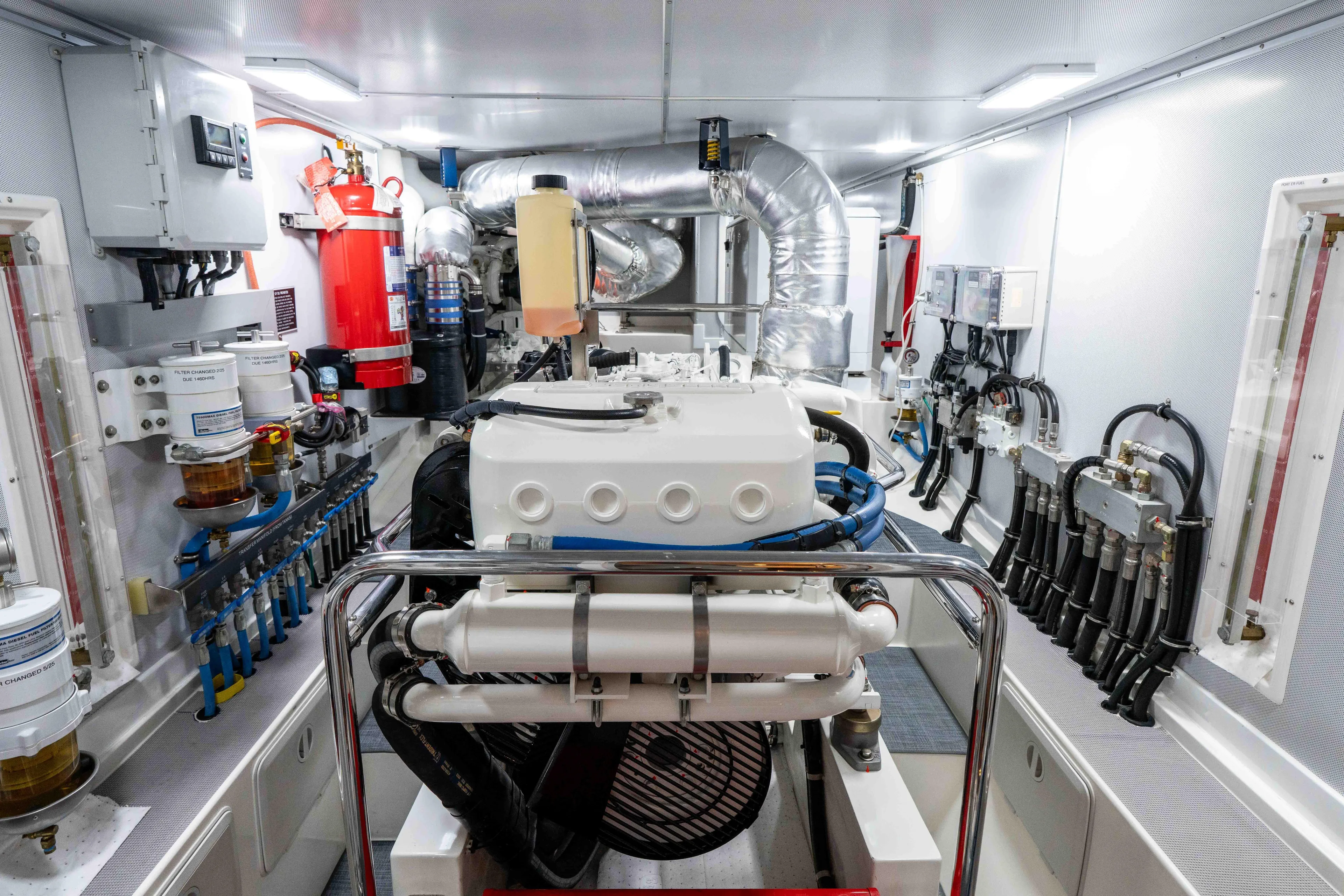 Martini Yacht Photos Pics Engine room of 2022 Nordhavn N63 yacht, featuring advanced machinery and equipment.
