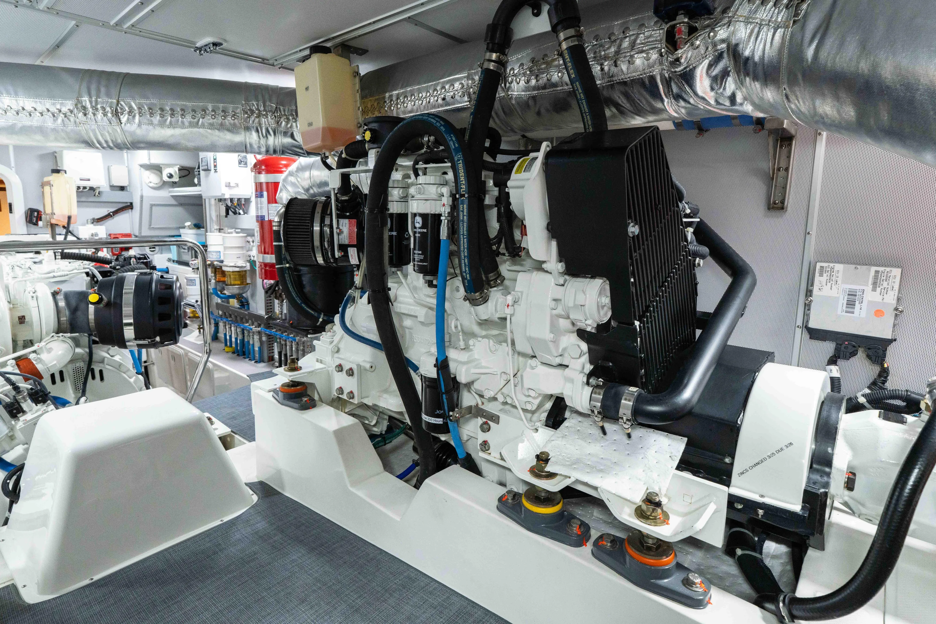 Martini Yacht Photos Pics Engine room of 2022 Nordhavn N63 yacht, showcasing advanced machinery and components.
