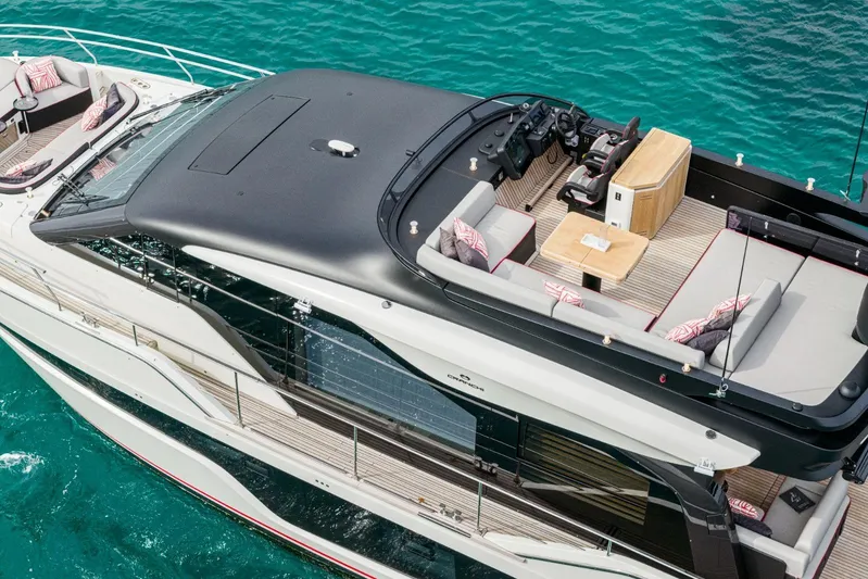  Yacht Photos Pics Luxury Cranchi Sessantasette 67 Corsa yacht, 2026 model, with elegant deck and seating area.