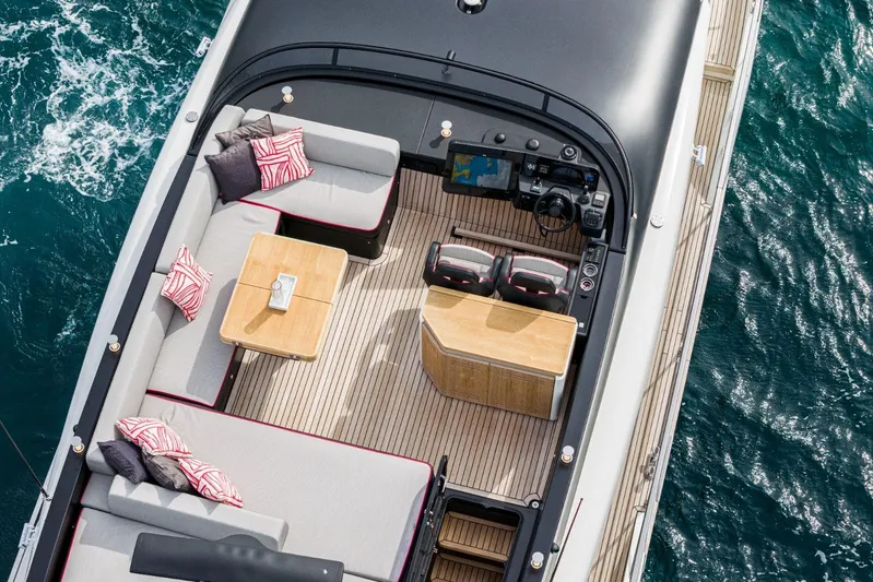  Yacht Photos Pics 2026 Cranchi Sessantasette 67 Corsa yacht deck with seating and navigation area.