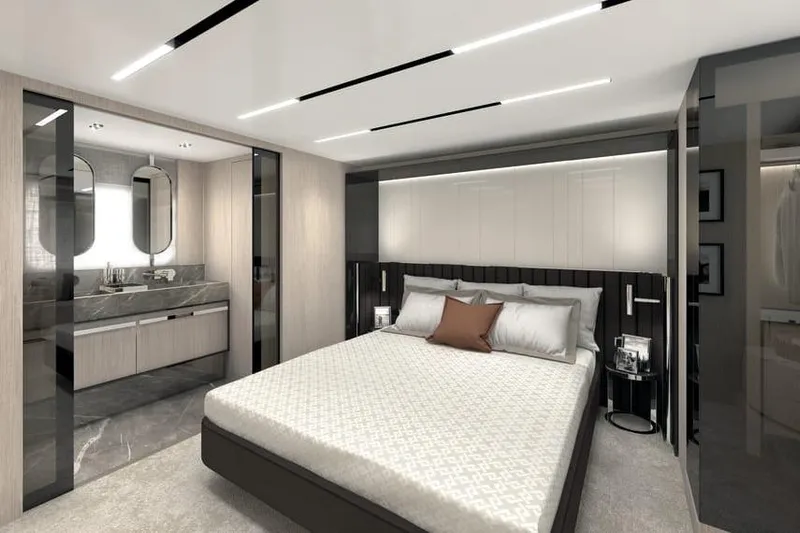  Yacht Photos Pics Luxurious bedroom interior of 2026 Cranchi Sessantasette 67 Corsa yacht, featuring modern design.