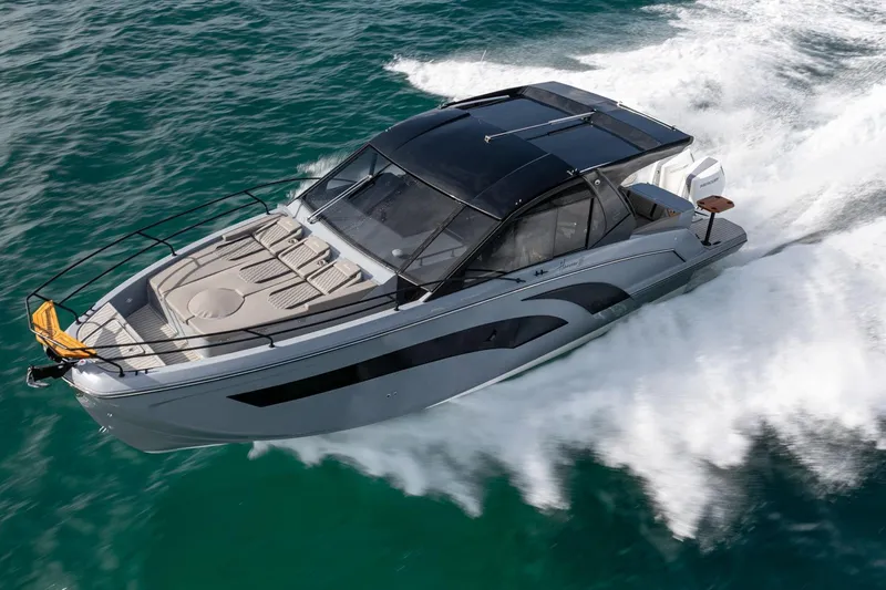  Yacht Photos Pics 2026 Hanover 387 boat cruising on open water, showcasing sleek design and powerful performance.