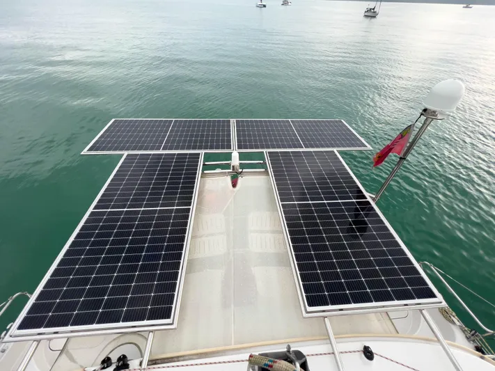 Whatabout Yacht Photos Pics Solar panels on Antares PDQ 44 yacht, 2005 model, floating on calm water.