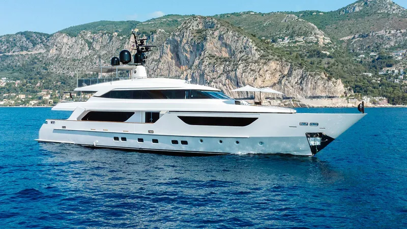 Away Yacht Photos Pics Luxury Sanlorenzo SD125 yacht cruising near rocky coastline, 2009 model.