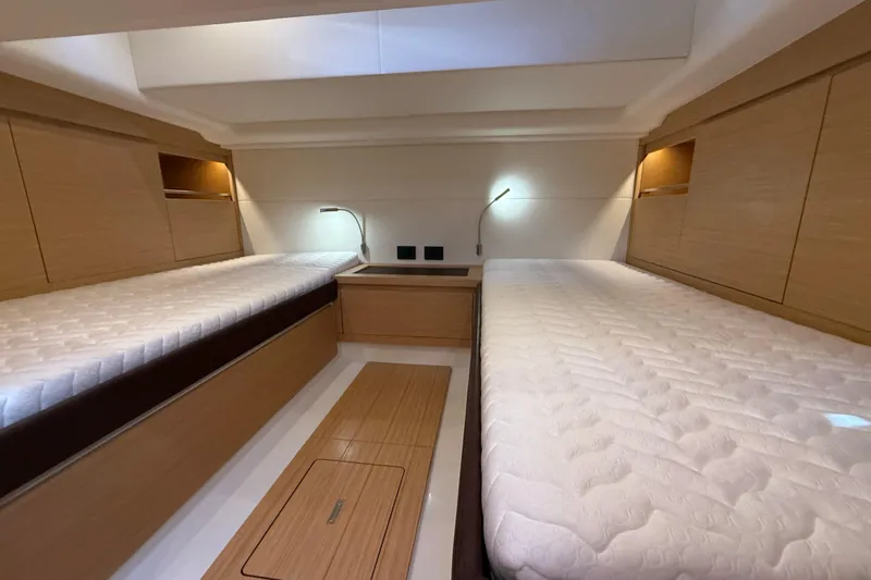 King Mouss Yacht Photos Pics Interior cabin of 2020 Pardo Yachts 43 with twin beds and modern lighting.