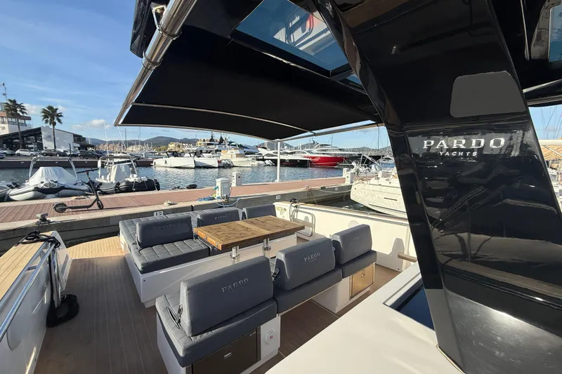 King Mouss Yacht Photos Pics Luxury 2020 Pardo Yachts 43 docked, featuring elegant seating and sleek design.