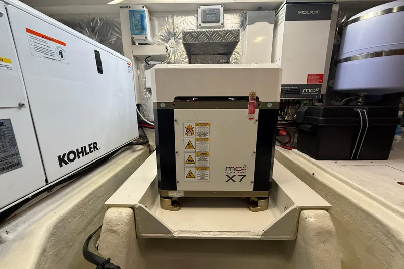 King Mouss Yacht Photos Pics Engine room of 2020 Pardo Yachts 43 featuring Kohler generator and Quick MC2 X7 gyro stabilizer.