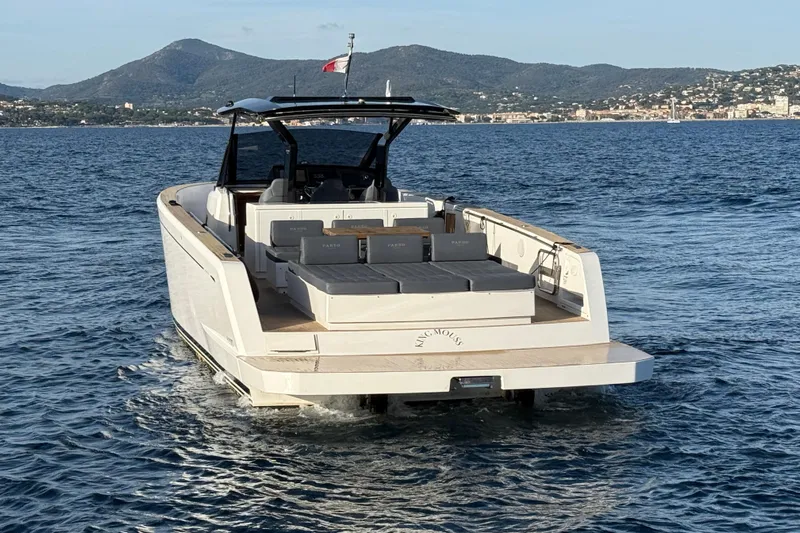 King Mouss Yacht Photos Pics 2020 Pardo Yachts 43 cruising on open water with scenic coastal backdrop.