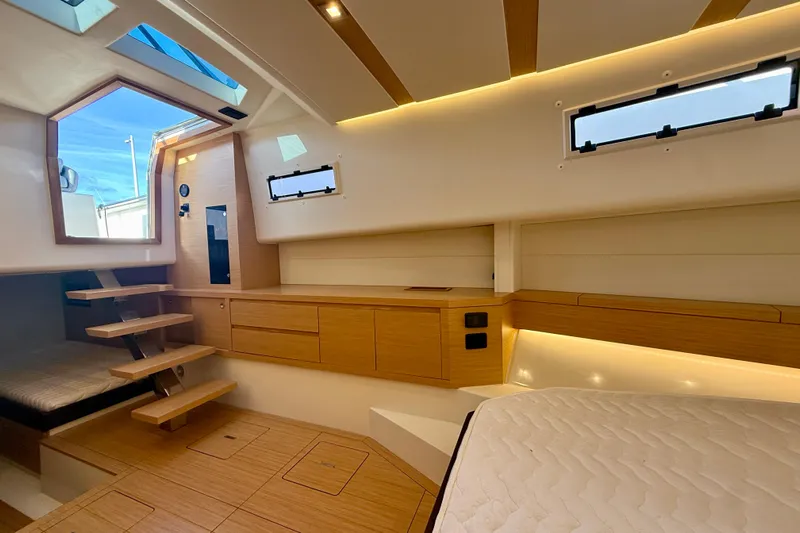 King Mouss Yacht Photos Pics Luxurious interior of 2020 Pardo Yachts 43 with modern wood finish and ample natural light.