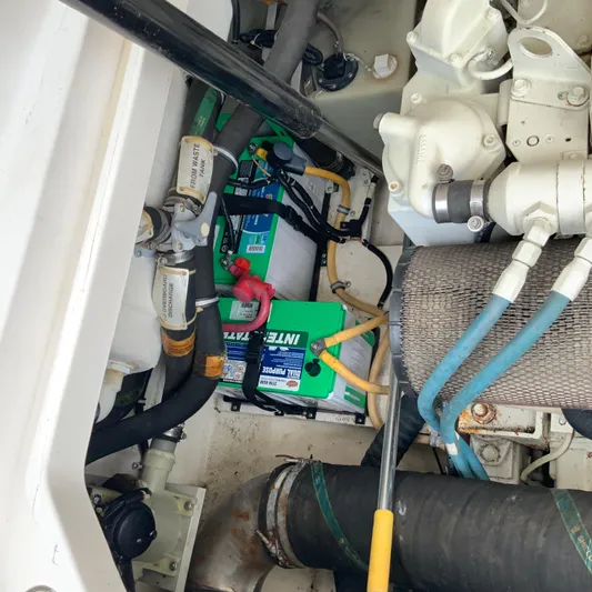  Yacht Photos Pics Engine compartment of a 2000 Tiara Sport 35 Open boat with batteries and hoses.
