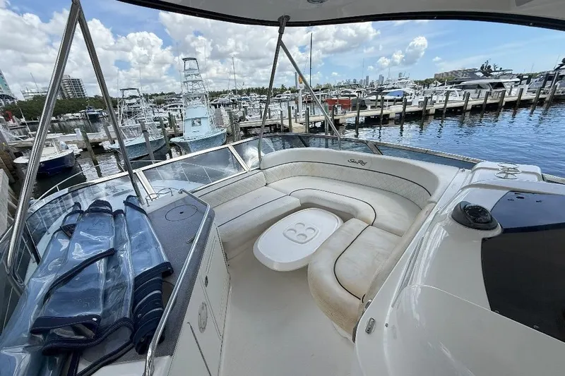  Yacht Photos Pics 2005 Sea Ray 500 Sedan Bridge yacht with spacious seating at marina.
